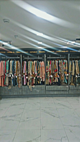 Grey retail clothing display - retail,